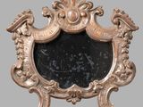 a mirror that is sitting on the wall