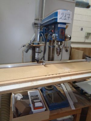 a machine that is sitting on a workbench in a room