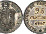 a silver coin with a coat of arms on it