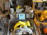 a lot of tools that are sitting on a table