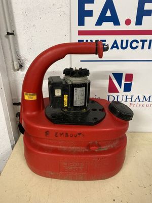 an image of a red fire hydrant sitting on top of a wooden table
