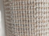 a close up of a woven basket on a table