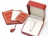 a red box with a ring inside of it on a white surface