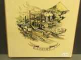une boîte sur laquelle figure l'image d'une usine