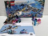 a box of legos and a book on a table