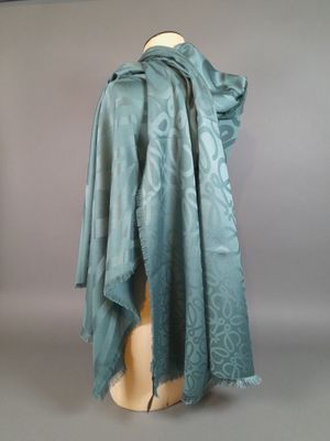 an image of a blue scarf on a mannequin mannequin