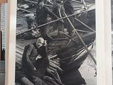 two black and white photos of a man on a boat