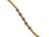 un bracelet en or serti de saphirs et de diamants