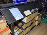 a table with a bunch of boxes on top of it