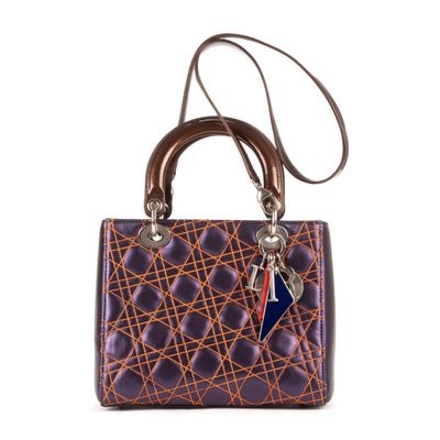 a close up of a purse on a white background