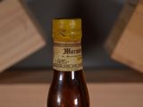 a bottle of alcohol that is sitting on a table