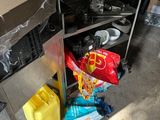 an image of a kitchen with a lot of junk on the floor
