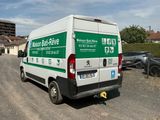 a van that is parked on the side of the road