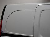 the back end of a white van with the door open