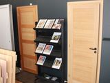 a room that has a book shelf and a book case in it