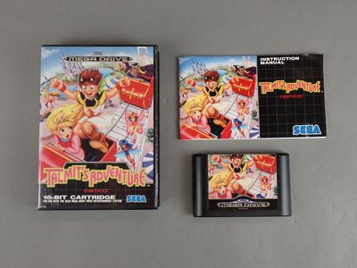 two nintendo games are sitting next to each other on a table