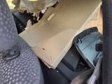 a cardboard box in the back seat of a car