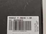 the back of a computer case with a bar code on it