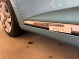 a close up of a car with a sticker on it