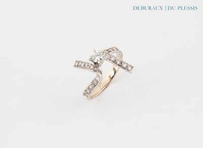 a close up of a diamond ring on a white background