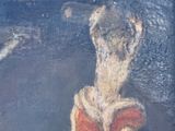 un tableau représentant une femme en train de lire un livre dans l'obscurité