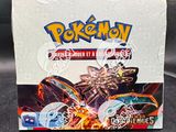 a box of pokemon trading cards sitting on top of a table