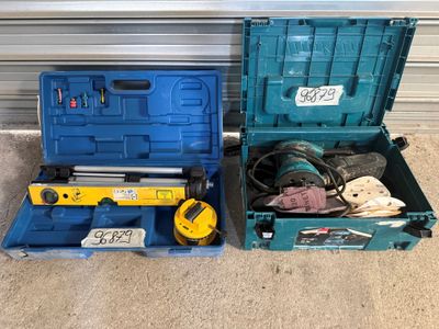 two tools in a blue tool box on the floor