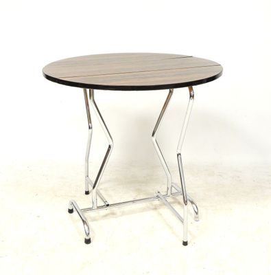 a small table with a wooden top and chrome legs