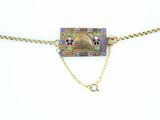 an image of a gold chain with a blue and green design on it