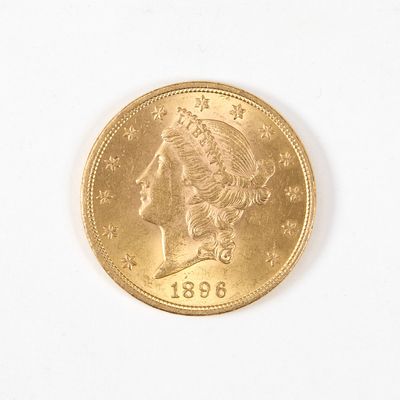 une pièce d'or ornée d'une tête de femme