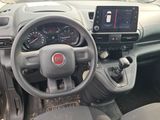a dashboard of a car with a steering wheel and a dash board