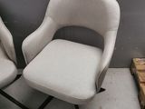 pair of mid century style chairs in the style of knollon