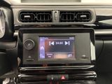 an image of a car dashboard with a car radio in it