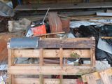 a pile of junk that is sitting on the ground