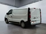 a white van that is parked in a garage