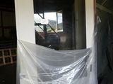 a large sheet of plastic covering the door of a building