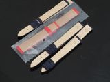 three pairs of skis sitting on top of a black surface