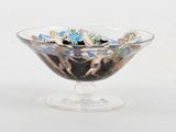 a glass bowl filled with a small amount of rocks
