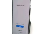 the back of a phone with a welcome screen on it