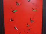 painting of birds flying in a circle on a red background