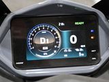 a digital display on the dashboard of a motorcycle