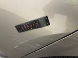 a close up of a sticker on the side of a car