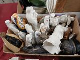 a box full of figurines sitting on a table