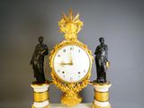 a clock that is sitting on top of a table
