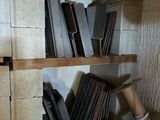 a book shelf that has a bunch of books on it