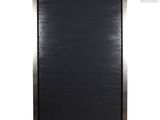 the blackboard is hanging on the wall in front of a white wall