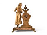 a statue of a woman and a clock on a stand