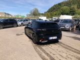 many cars parked in a parking lot in a lot