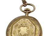 an image of a close up of a pocket watch on a white background