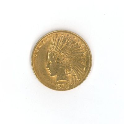 une pièce d'or sur laquelle est représentée une tête d'Indien